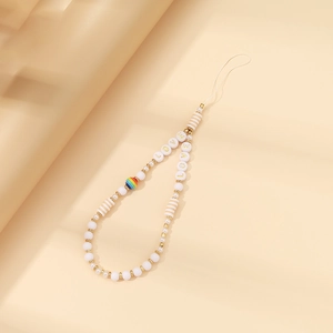 Detail of handmade beaded phone strap with LOVE letter beads and gold accents
