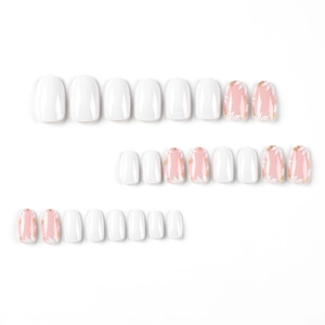 Short oval press-on nails set with minimalist white, pink leaf patterns and gold foil detail