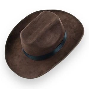 Detail of a brown faux suede cowboy hat with a black satin band and smooth texture