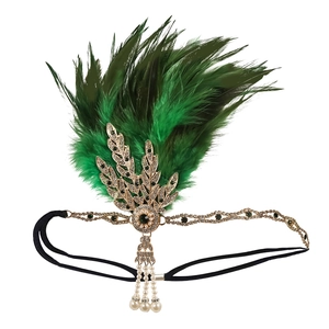 Detail of luxury 1920s headband with green feathers, rhinestones and pearl tassels