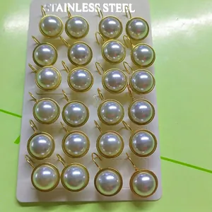 Polished stainless steel French leverback earrings with round white pearls on card