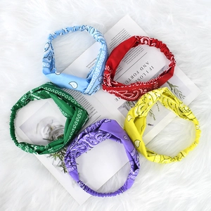 5-pack colorful paisley pattern knotted headbands in blue, red, green, purple and yellow