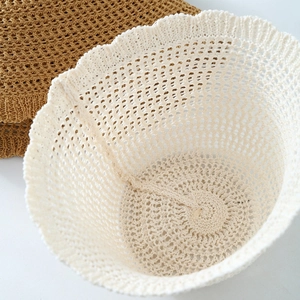 Hollow crochet knit bucket hat for women in beige and coffee colors with wavy brim