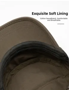 Detail of soft cotton lining and sweatband inside a brown flat top baseball hat