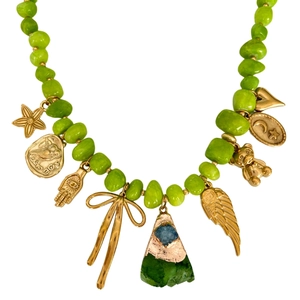 Golden butterfly pendant necklace with green beads and mixed charms including Hope coin