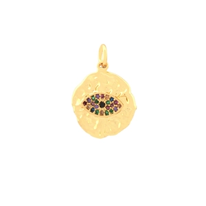 Macro detail of golden circular pendant with hammered texture and colorful evil eye inlay