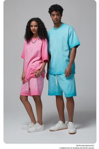 Couples in oversized pink and blue washed cotton t-shirt and shorts streetwear sets