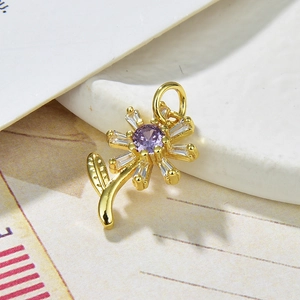 Elegant gold sunflower necklace with purple gemstone and clear crystal petals