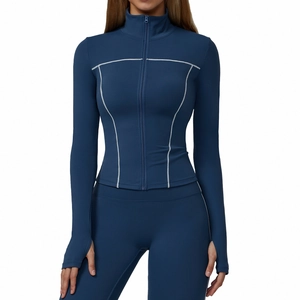 Slim fit navy yoga jacket with contrast stitching and thumbholes for outdoor running