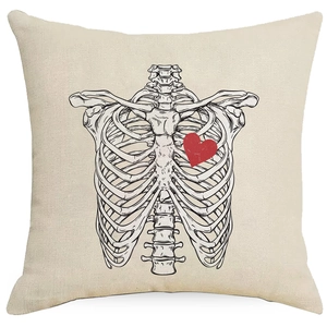 Detail view of Halloween linen pillowcase with black rib cage and red heart print