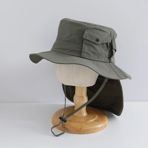 Detail of army green sun hat featuring a side pocket and adjustable drawstring