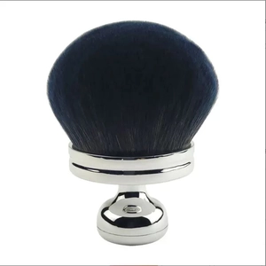 Detail view of deep blue soft bristles and chrome-plated metal handle on large neck duster brush