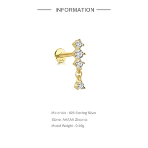 Detail of S925 sterling silver dragonfly stud with AAAAA zirconia and gold finish