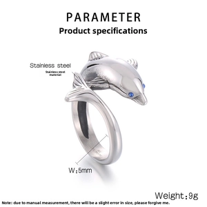 Detail view of 5mm stainless steel dolphin ring featuring blue stone eyes and 316L stamp