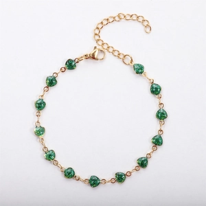 18k gold plated stainless steel bracelet with green glitter heart charms and lobster clasp
