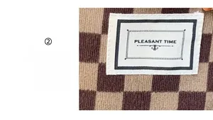 Detail van geruite corduroy tas met een vintage Pleasant Time geweven stoffen label