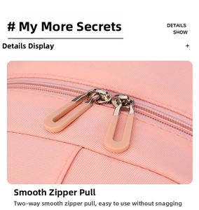 Detail of pink backpack featuring smooth dual metal zippers and durable twill fabric