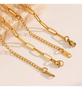 Close-up of 18K gold plated stainless steel paperclip chain with lobster clasp detail
