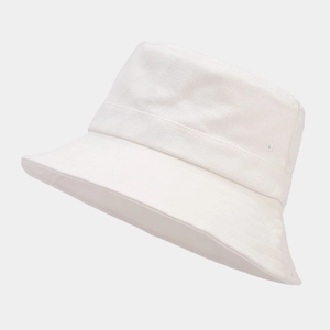 Detailed view of white cotton bucket hat with stitching details and side air vents