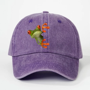 Detailed view of the purple washed cotton baseball cap with a 3D green tree frog print