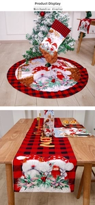 Detail of red and black buffalo plaid Christmas decor set with Santa and reindeer motifs