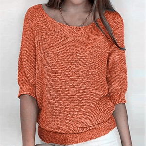 Women's knit sweater in vibrant orange with three-quarter sleeves and round neckline