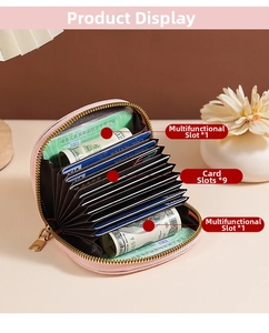 Interior detail of pink accordion card wallet with nine slots and gold zipper hardware