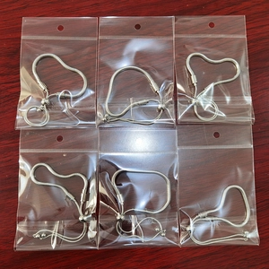Detail of silver snake chain bracelets with sliding ball clasps for DIY jewelry making