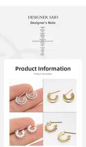 Detail view of 18K gold and silver sunflower geometric stud earrings with sunburst pattern