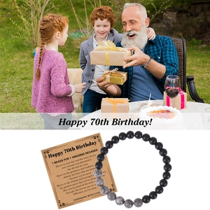 Detail of 70th birthday gift bracelet with natural stone beads and greeting card