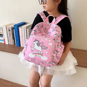 Pink toddler backpack with unicorn prints, featuring main compartment and front pocket