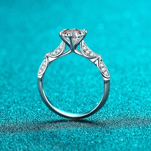 Classic S925 sterling silver ring with large round moissanite and side diamond accents