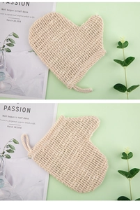 Detail of natural sisal bath glove with textured weave and convenient hanging loop