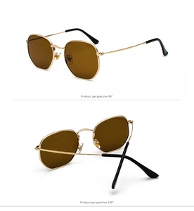 Detalle de gafas de sol de metal irregular con lentes marrón oscuro y puntas antideslizantes