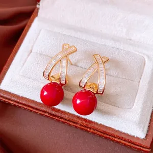 18k gold plated stud earrings with sparkling cubic zirconia and round red bead drops