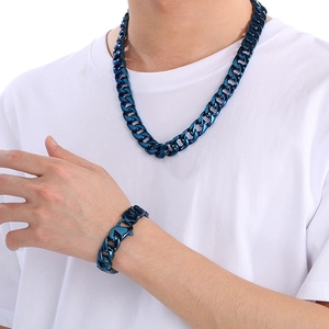 Close-up of model wearing 15mm blue hiphop cuban link chain necklace and bracelet set