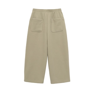 Detail of wide-leg knit trousers showing the back view with dual patch pockets