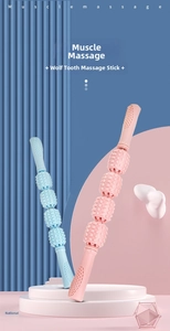 Detail view of pink and blue muscle massage rollers with four spiky rotating spheres