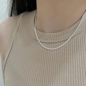 Minimalist 925 sterling silver curb chain necklace shown on model for a trendy look