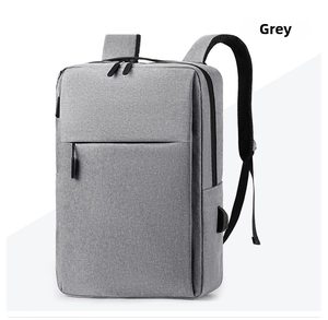 Grey minimalist laptop backpack with external USB port and hidden zipper pocket