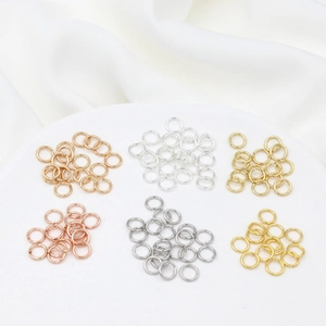 14K gold plated jump rings in six colors on white tray for DIY jewelry making