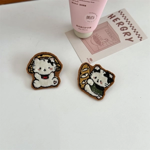 Detailed embroidery of cartoon cat patches with headphone and bread designs
