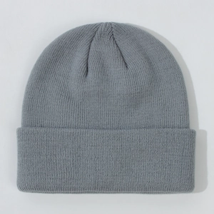 Detailed view of the soft knitted texture and cuffed edge of the grey baby beanie