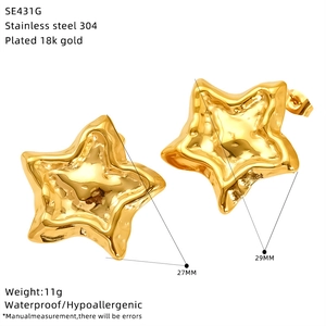 Detail of 18k gold plated star earrings with dimensions 27mm x 29mm and material specs