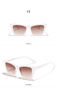 Detail view of white square cat eye sunglasses with brown lenses and C5 model number label