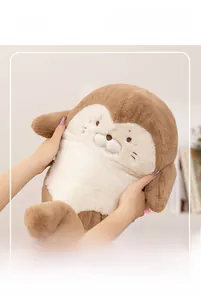 Soft seal plush toy detail showing fluffy brown fur and cute facial embroidery details