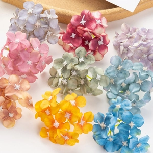 Artificial silk hydrangea flower heads in various vibrant colors for DIY crafts and decor