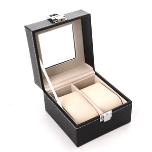 Dual-slot black leather watch box with glass window and beige interior cushions