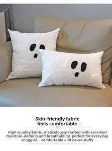 Close-up of Halloween ghost embroidery on white loop velvet cushion covers for sofa decor