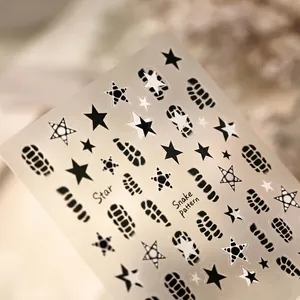Minimalist black and white star pattern nail art stickers featuring cool street style